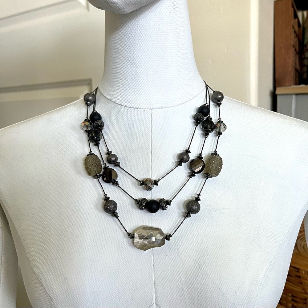 Three strand beaded necklace